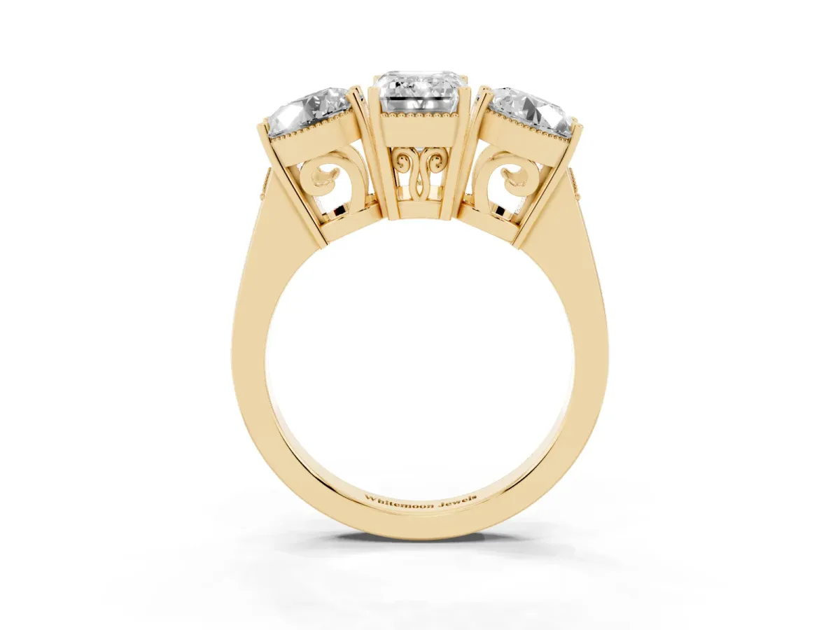 Three-Stone Emerald Cut Diamond Engagement Ring with Prong Setting on a Classic Band Yellow gold