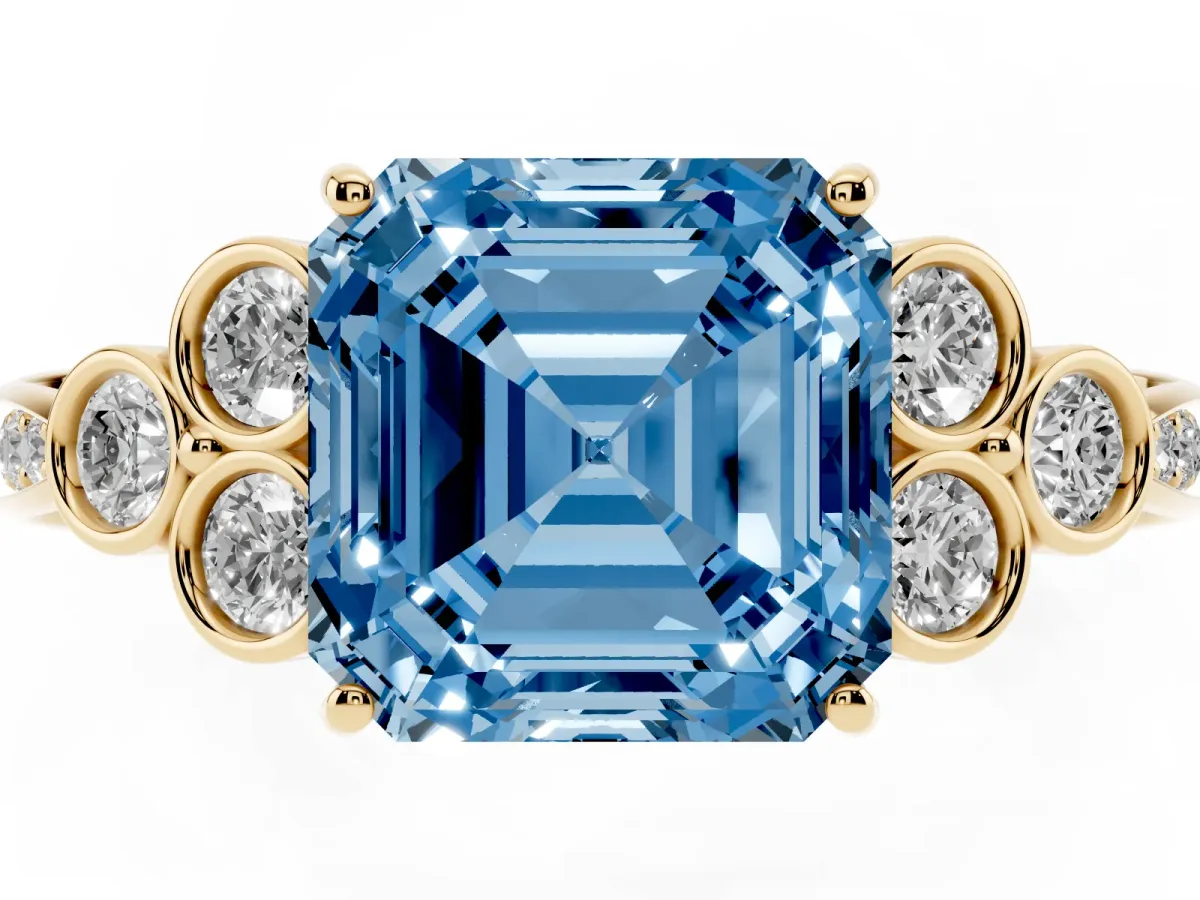 Fancy Blue Asscher Cut Cut Diamond Engagement Ring with Bezel Set Round Side Stones and Prong Setting Yellow gold