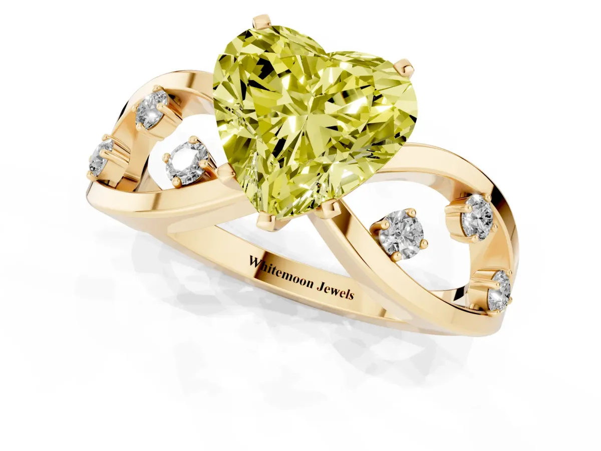 Fancy Yellow Heart Cut Cut Solitaire Diamond with Side Stones on Criss-Cross Band and Four-Prong Setting Yellow gold