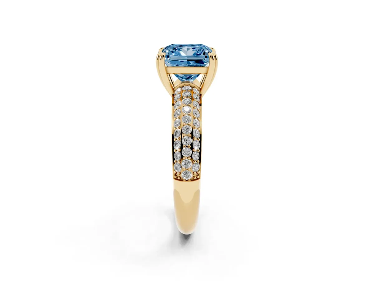 Fancy Blue Princess Cut Diamond Solitaire Ring with Multi-Row Round Pavé Band and Prong Setting Yellow gold