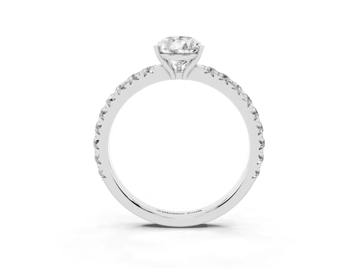 Pear Cut Diamond Pavé Solitaire Engagement Ring with Four-Prong Setting Platinum