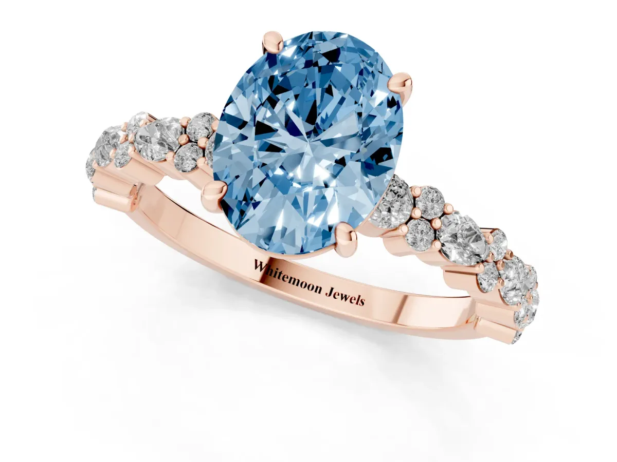 Fancy Blue Oval Cut Diamond Side Stone Solitaire Ring with Round and Four-Prong Setting Rose gold