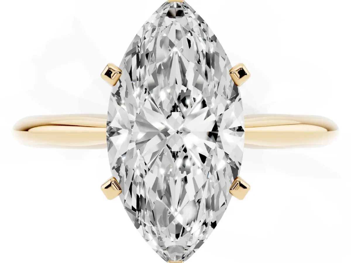 Marquise Cut Cut Solitaire Ring with Four-Prong Setting on a Classic Band Yellow gold