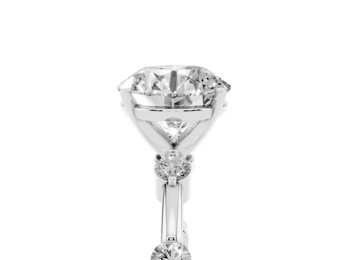 Round Cut Solitaire Diamond Ring with Bezel Set Side Stones and Prong Setting Silver