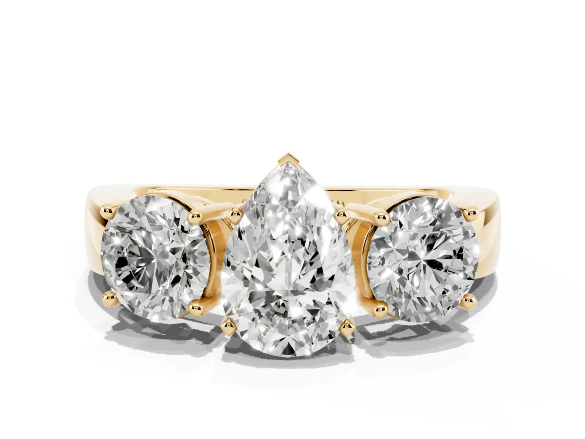 Three-Stone Pear Cut Diamond Ring with Round Side Stones, Classic Band, and Four-Prong Setting Yellow gold