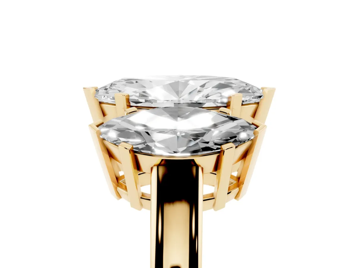 Three-Stone Marquise Cut Cut Diamond Ring with Channel Set Band and Four-Prong Setting Yellow gold