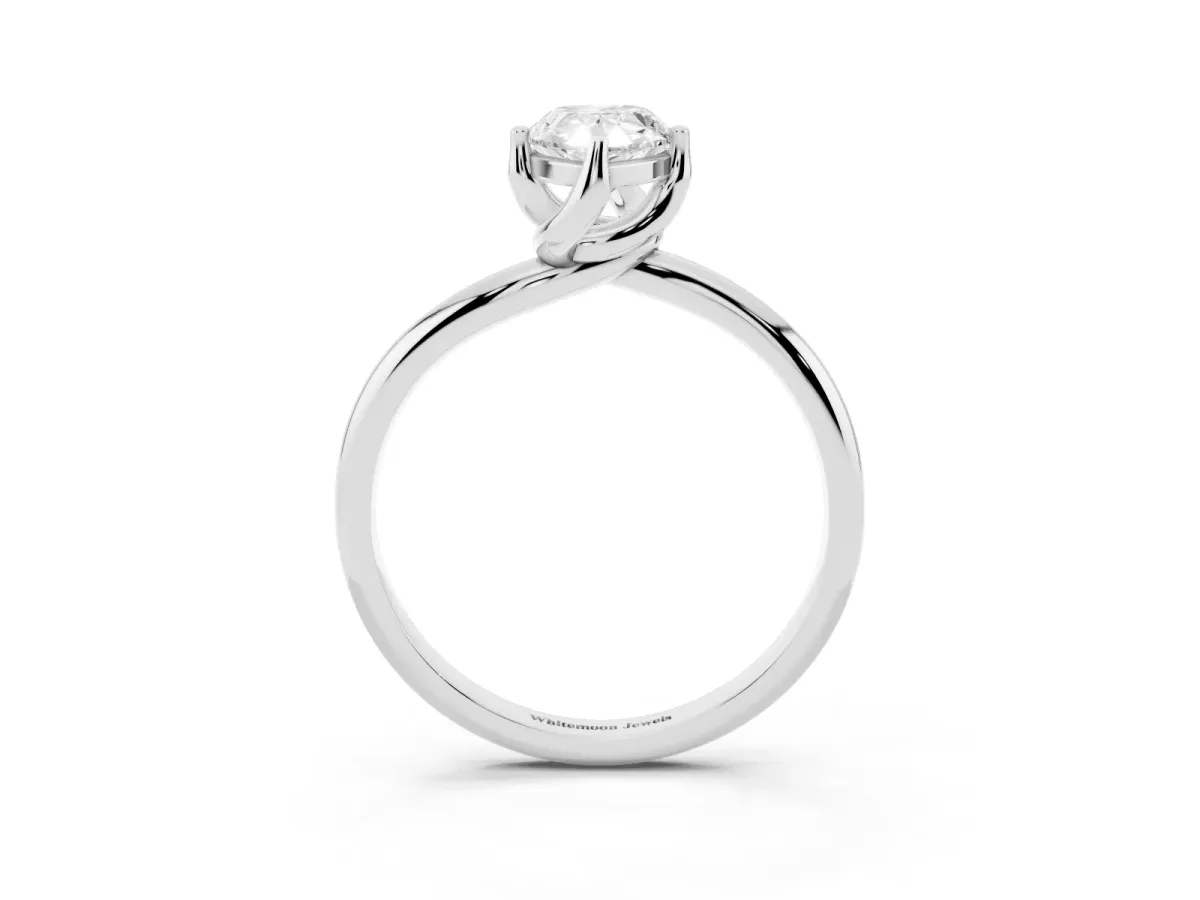 Pear Cut Diamond Solitaire Engagement Ring with Four-Prong Setting and Classic Band Silver