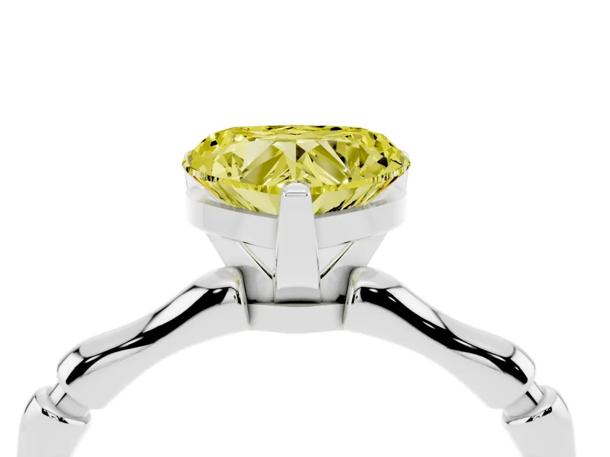 Fancy Yellow Heart Cut Solitaire Diamond Ring with Bamboo Band and Four-Prong Setting Silver