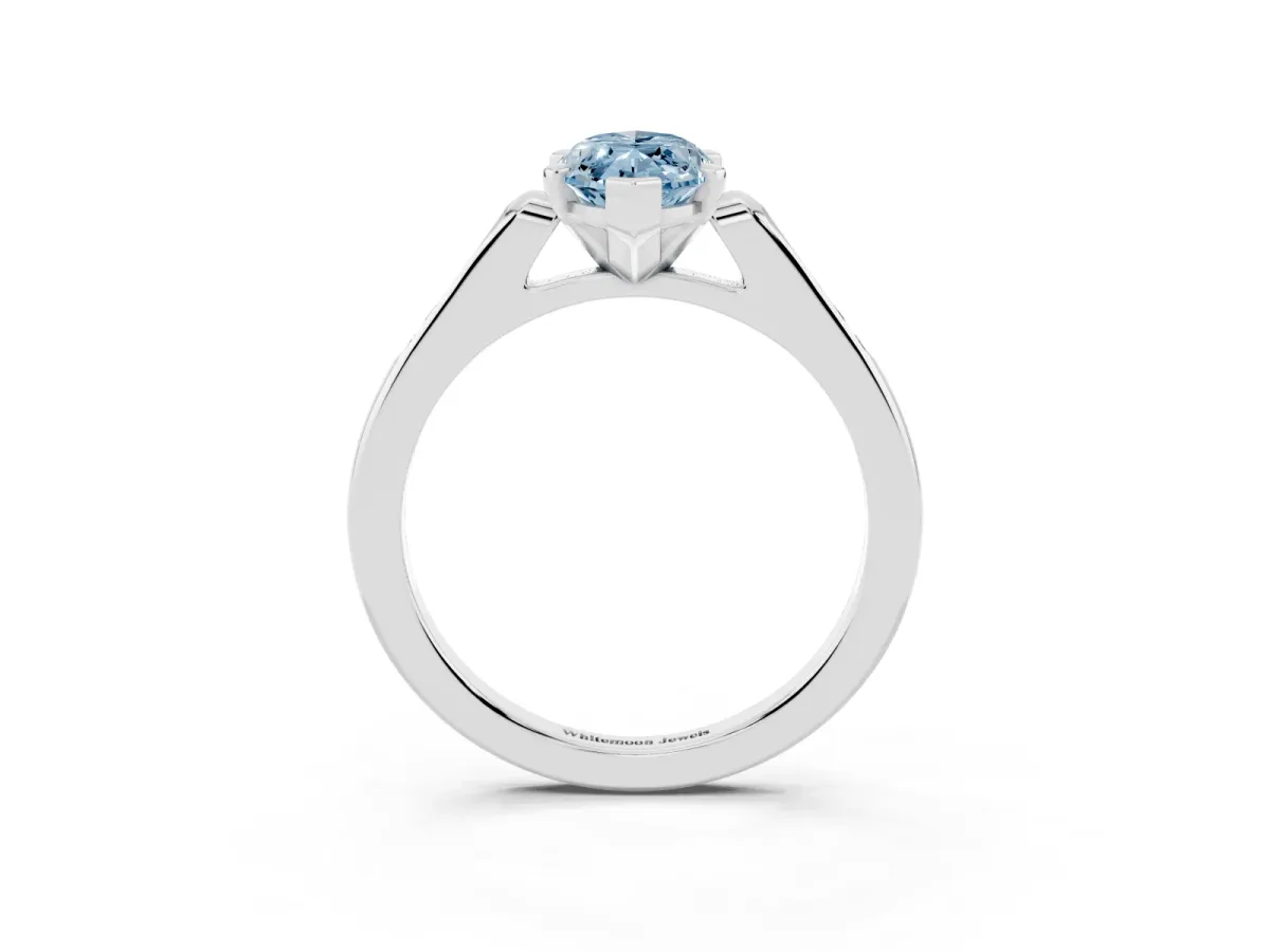 Fancy Blue Marquise Cut Diamond Solitaire Ring with Channel Set Round Band and Prong Setting Silver