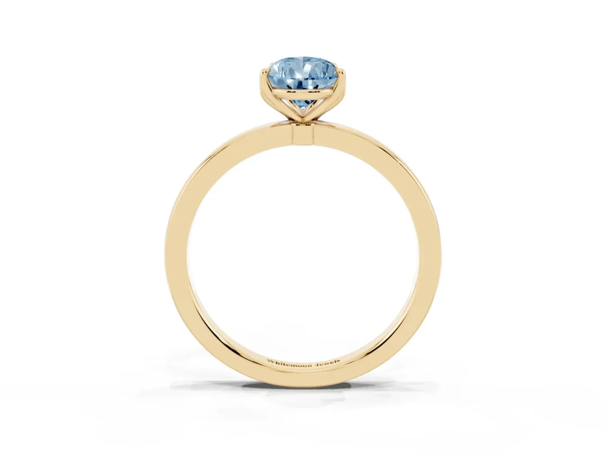 Fancy Blue Pear Cut Diamond Solitaire Ring with Thin Band and Prong Setting Yellow gold