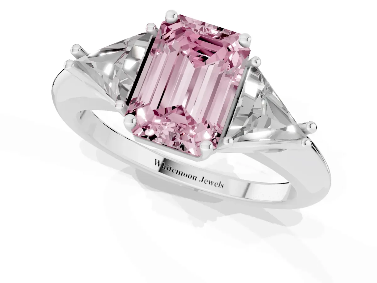Fancy Pink Three-Stone Emerald Cut Diamond Engagement Ring with Trillion Side Stones and Prong Setting Silver