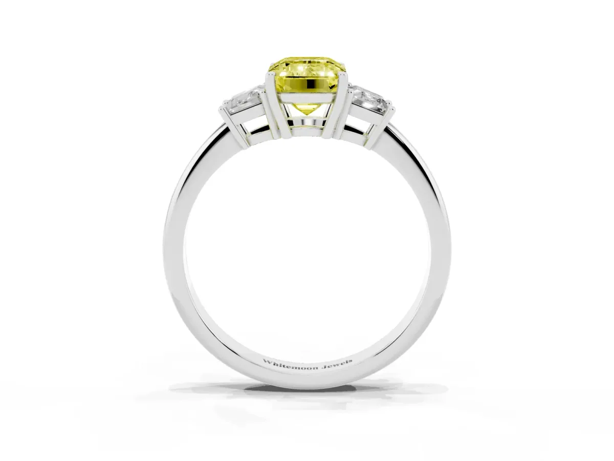 Fancy Yellow Emerald Cut Diamond Three-Stone Ring with Trapezoid Side Stones and Prong Setting Silver
