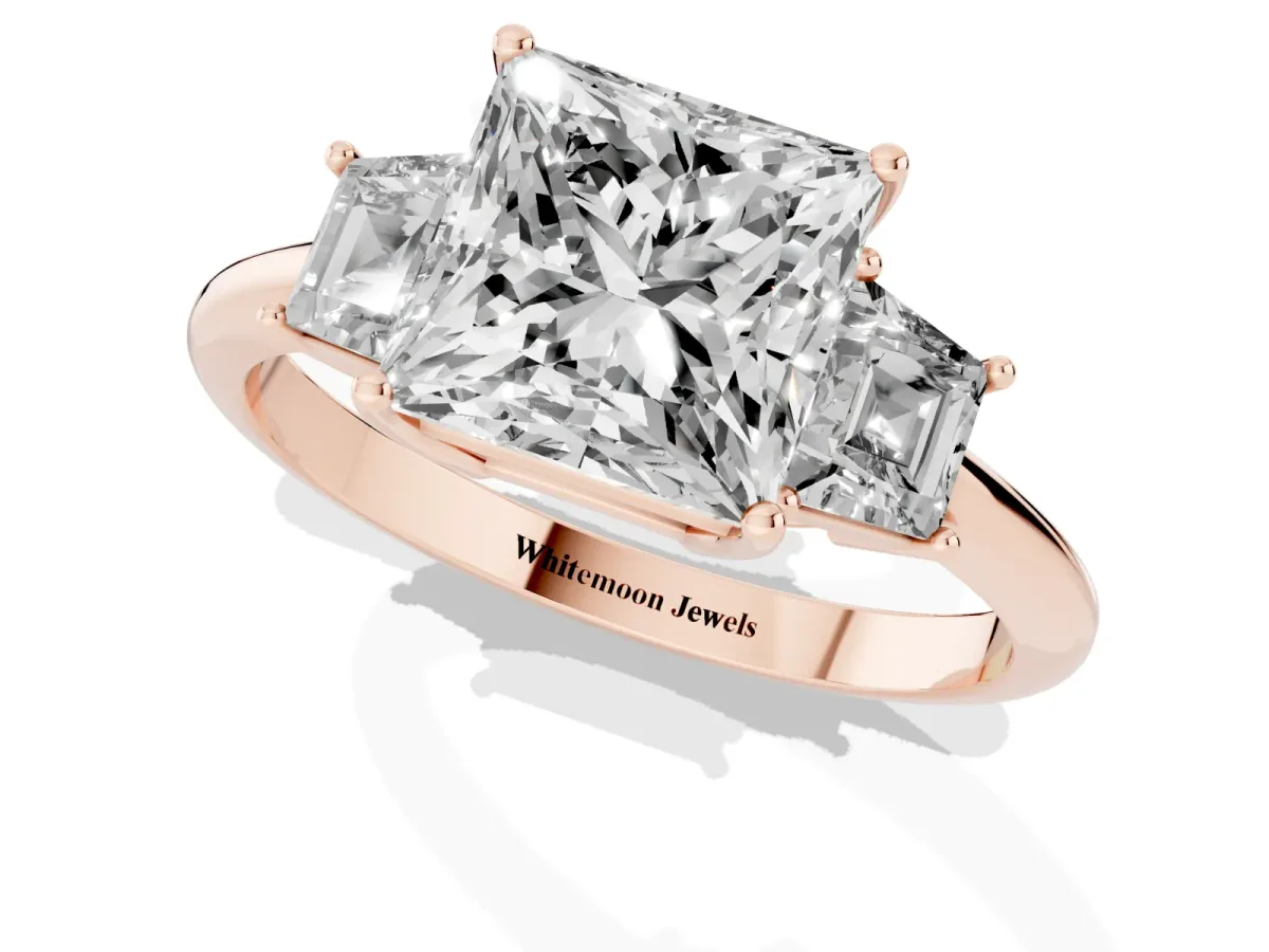Princess Cut Diamond Three-Stone Ring with Trapezoid Side Stones and Prong Setting Rose gold