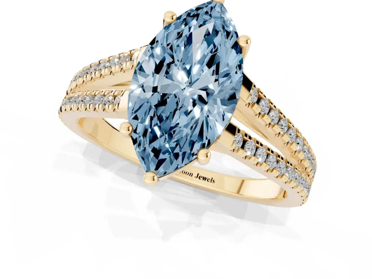 Fancy Blue Marquise Cut Diamond Solitaire Engagement Ring with Split Shank Pavé Band Yellow gold