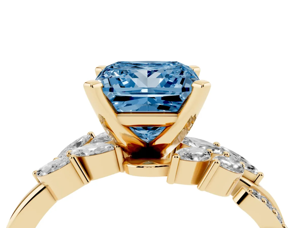 Fancy Blue Princess Cut Solitaire Marquise Twist Band with Six-Prong Setting Yellow gold