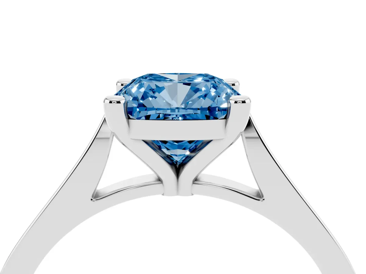 Fancy Blue Cushion Cut Solitaire Diamond Ring with Four-Prong Setting and Tapered Band Platinum