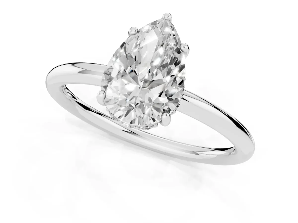 Pear Cut Solitaire Diamond Ring with a Classic Band and Four-Prong Setting Platinum