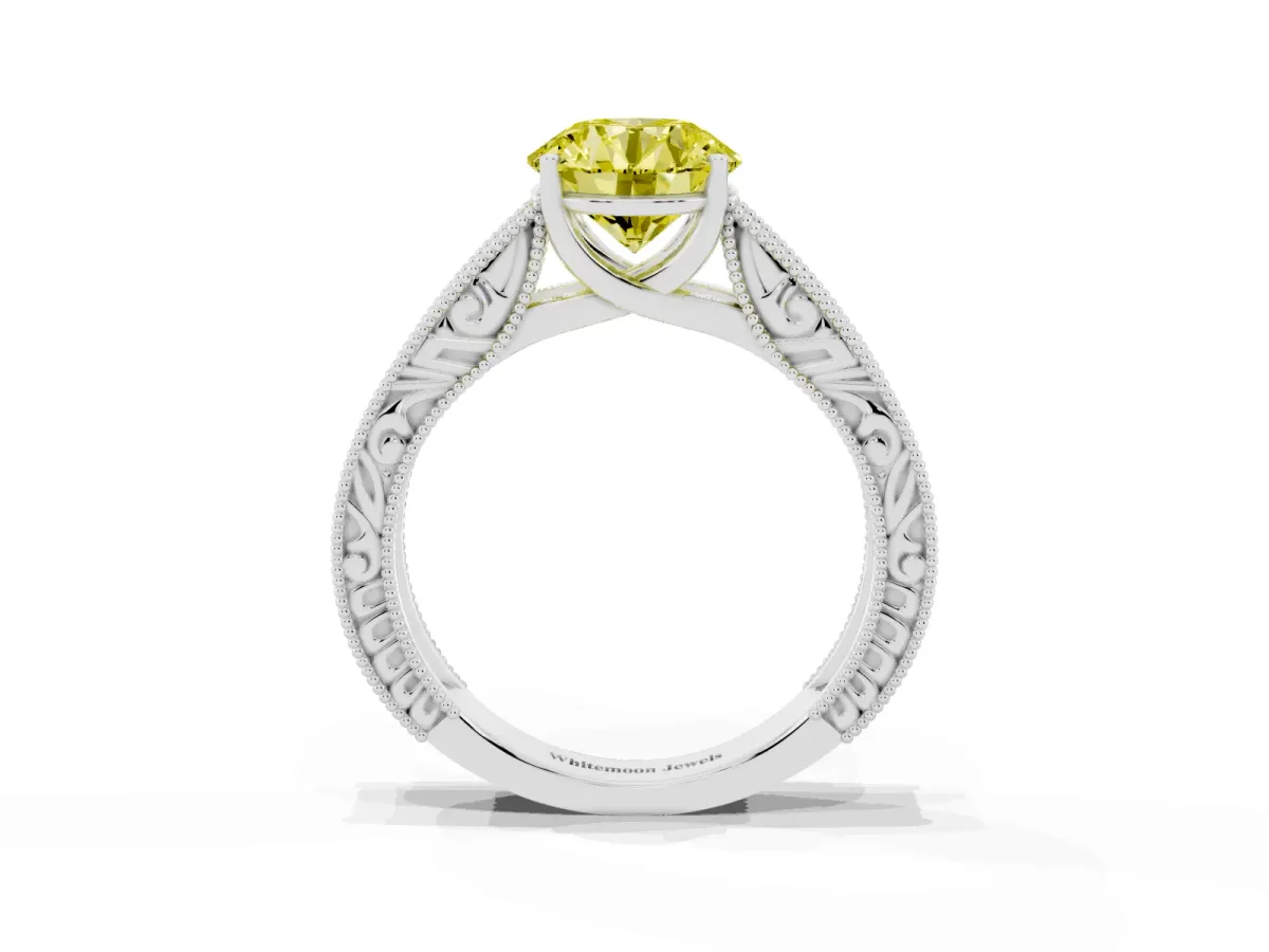 Fancy Yellow Round Cut Diamond Solitaire Ring with Engraved Band and Four-Prong Setting White gold