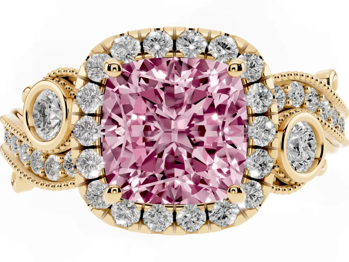 Fancy Pink Cushion Cut Halo Diamond Ring with Milgrain and Bezel Accents on a Split Shank Band Yellow gold