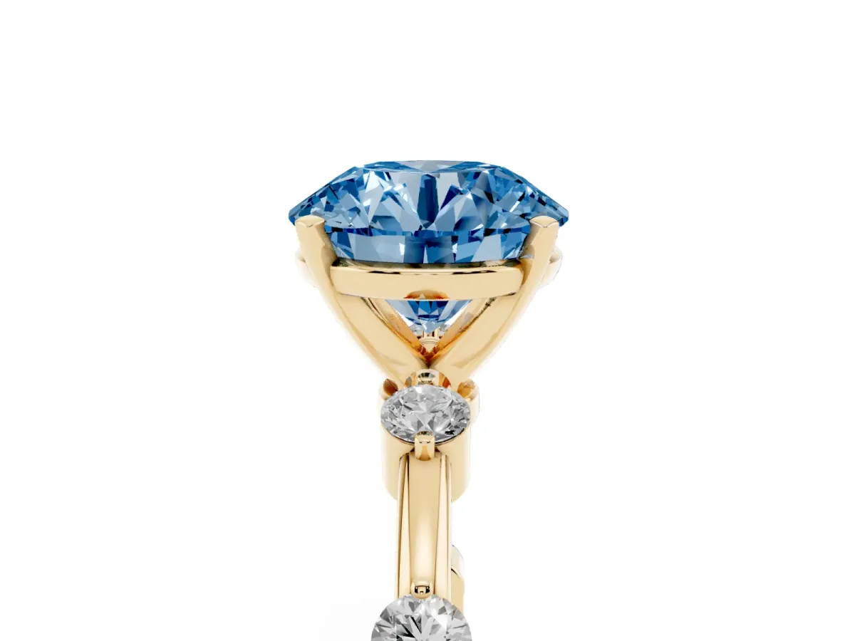 Fancy Blue Round Cut Solitaire Diamond Ring with Bezel Set Side Stones and Prong Setting Yellow gold