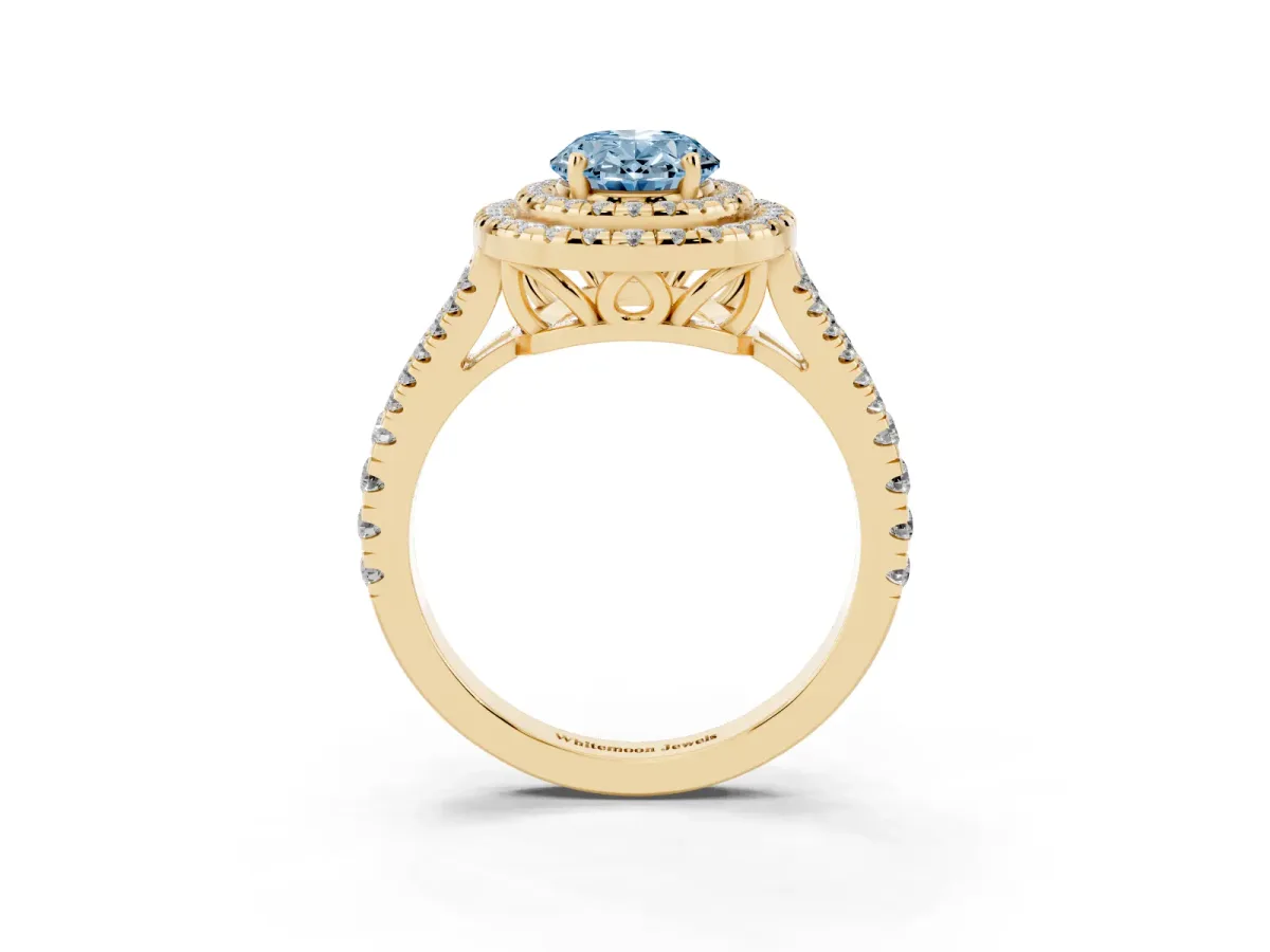 Fancy Blue Oval Cut Diamond Double Halo Ring with Pavé Band and Prong Setting Yellow gold