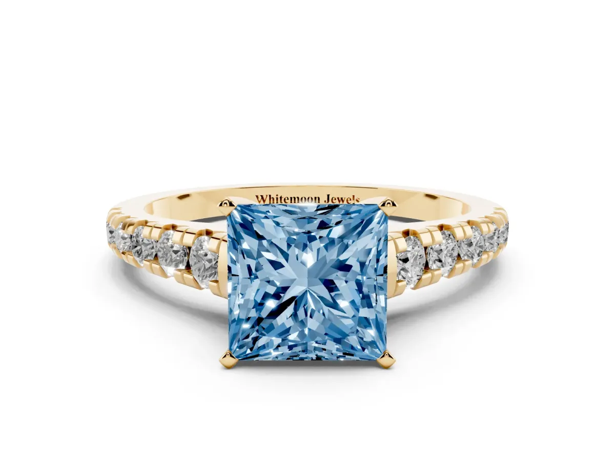 Fancy Blue Princess Cut Diamond Cathedral Solitaire Ring with Round Pavé Band Yellow gold