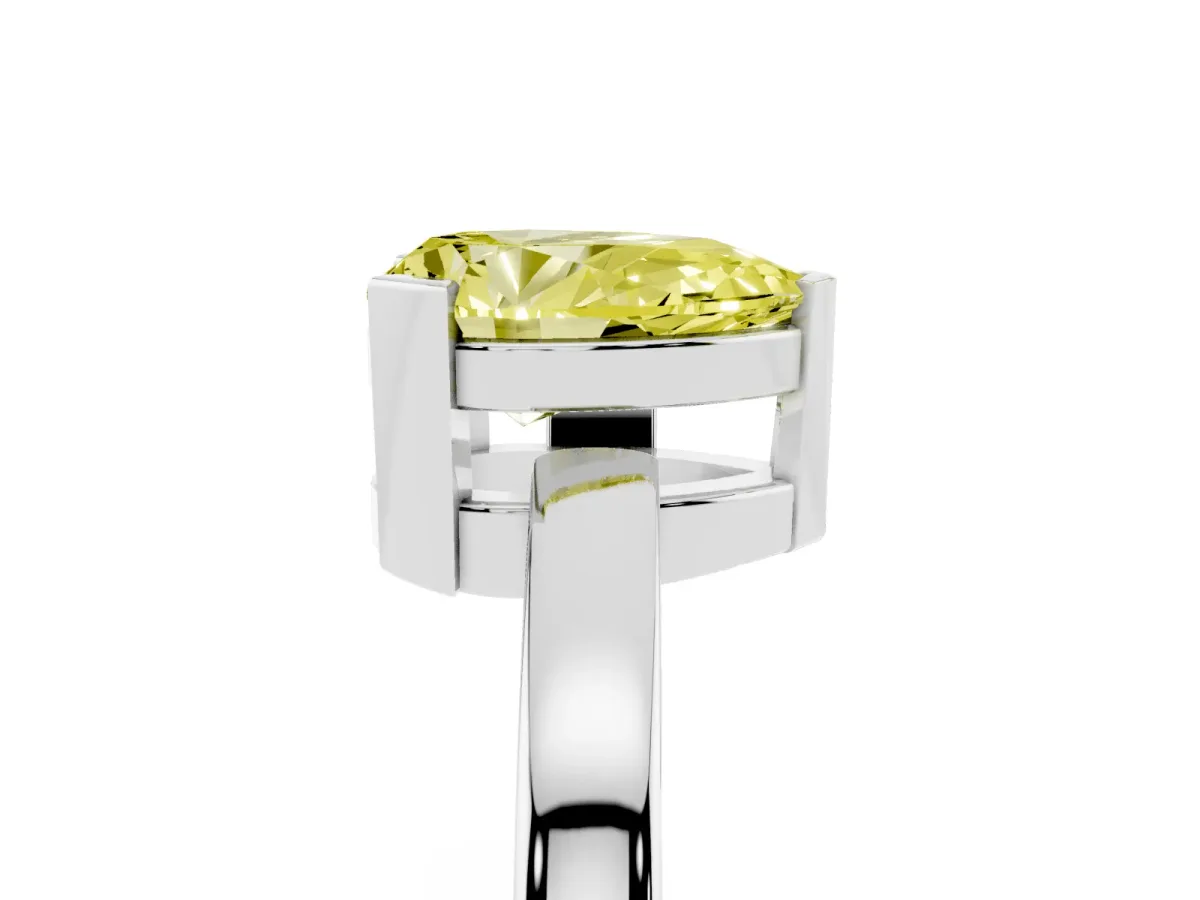 Fancy Yellow Pear Cut Cut Solitaire Ring with Four-Prong Setting and Classic Band Platinum