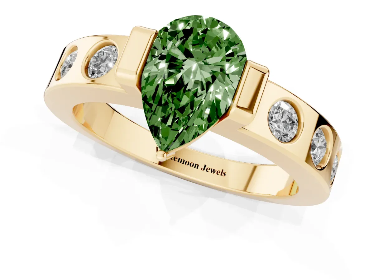 Fancy Green Pear Cut Brilliant Channel-Set Diamond Ring with Bezel Prong Setting Yellow gold