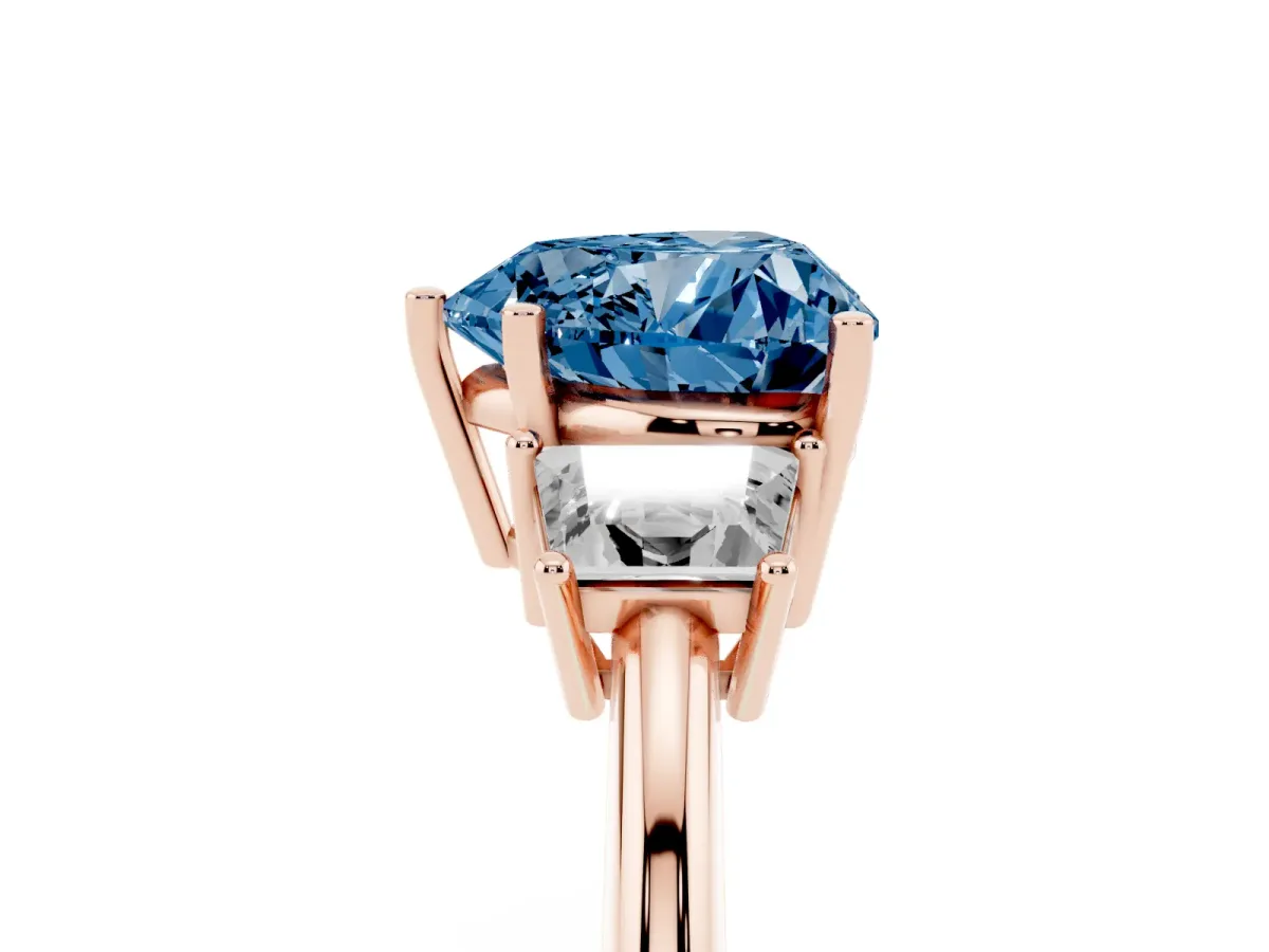 Fancy Blue Heart Cut Diamond Three-Stone Ring with Trapezoid Side Stones and Prong Setting Rose gold