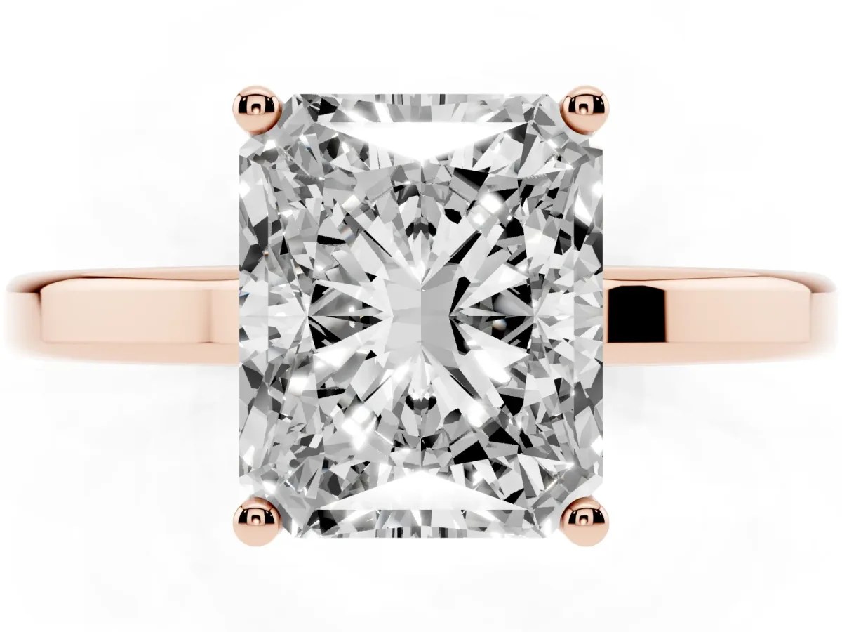 Radiant Cut Cut Solitaire Engagement Ring with Four-Prong Setting on a Classic Band Rose gold