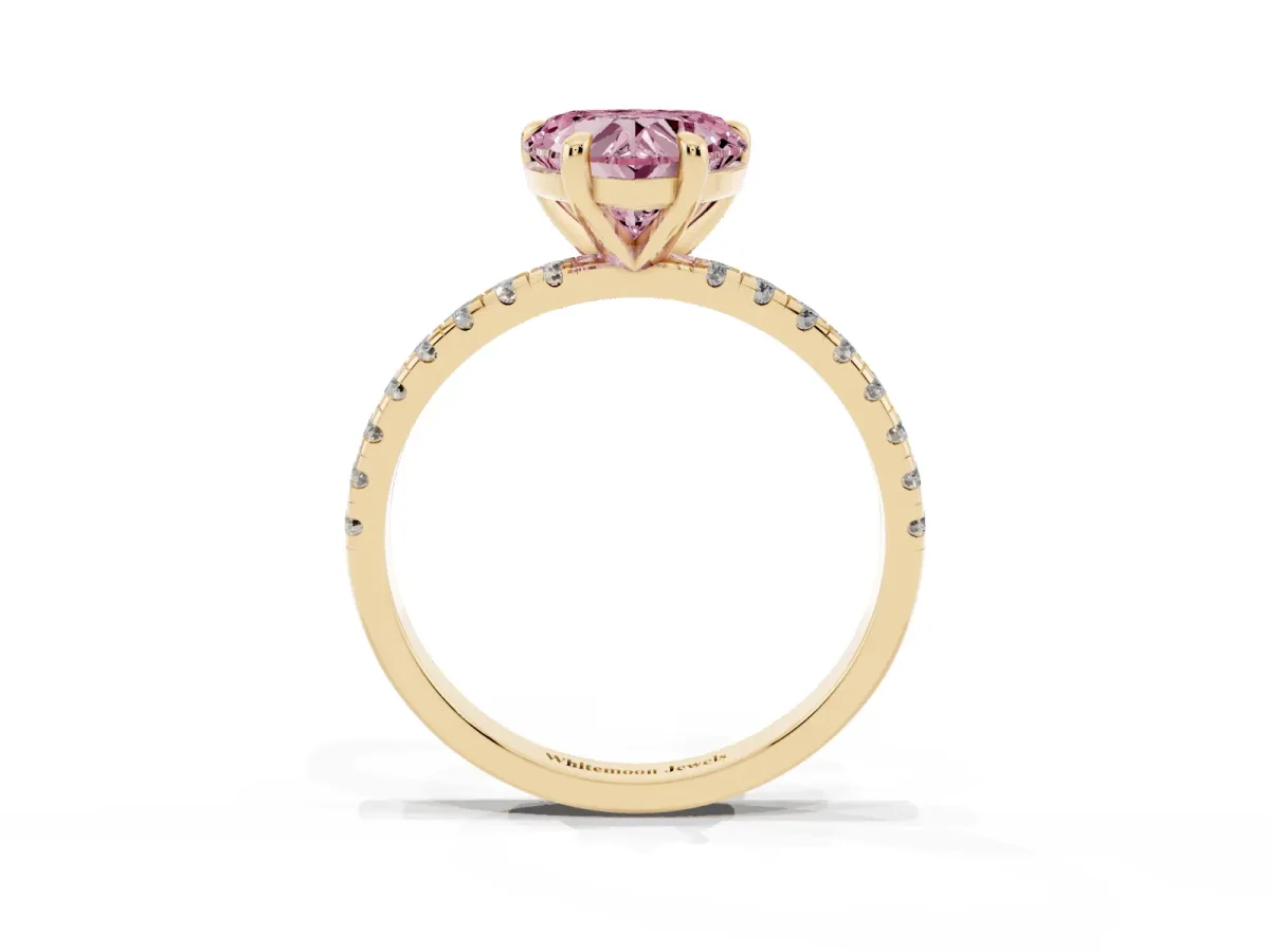 Fancy Pink Heart Cut Diamond Brilliant Solitaire Ring with Pavé Band and Four-Prong Setting Yellow gold