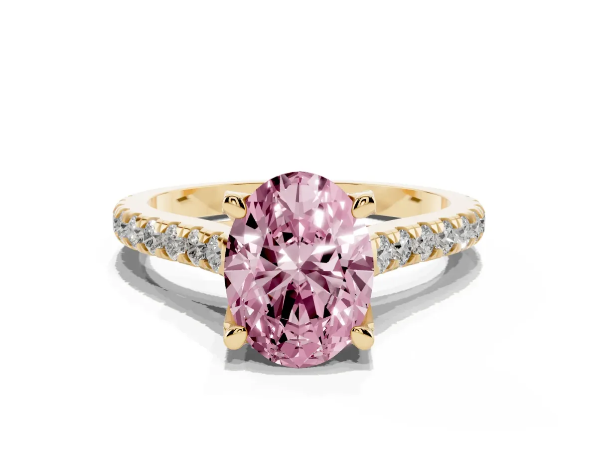 Fancy Pink Oval Cut Brilliant Diamond Solitaire with Pavé Band and Four-Prong Setting Yellow gold