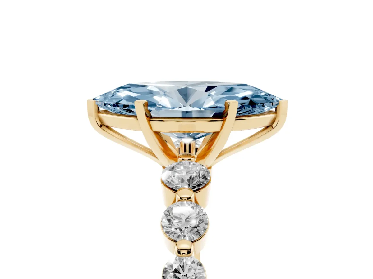 Fancy Blue Marquise Cut Solitaire Diamond Ring with Pave Band and Four-Prong Setting Yellow gold