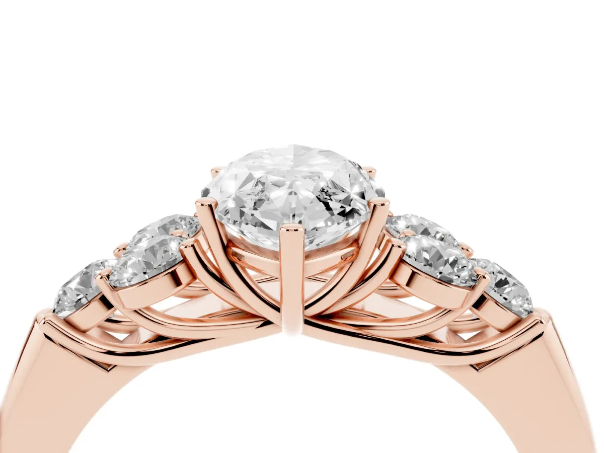 Marquise Cut Cut Diamond Cluster Ring with Round Accent Stones and Prong Setting on a Classic Band Rose gold