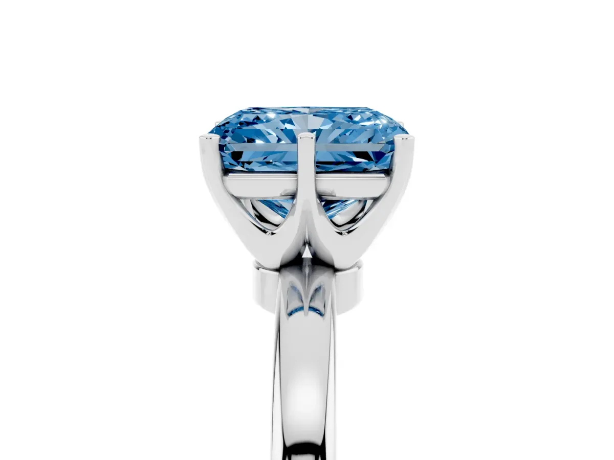 Fancy Blue Radiant Cut Solitaire Diamond Ring with Six-Prong Setting on a Classic Band Silver