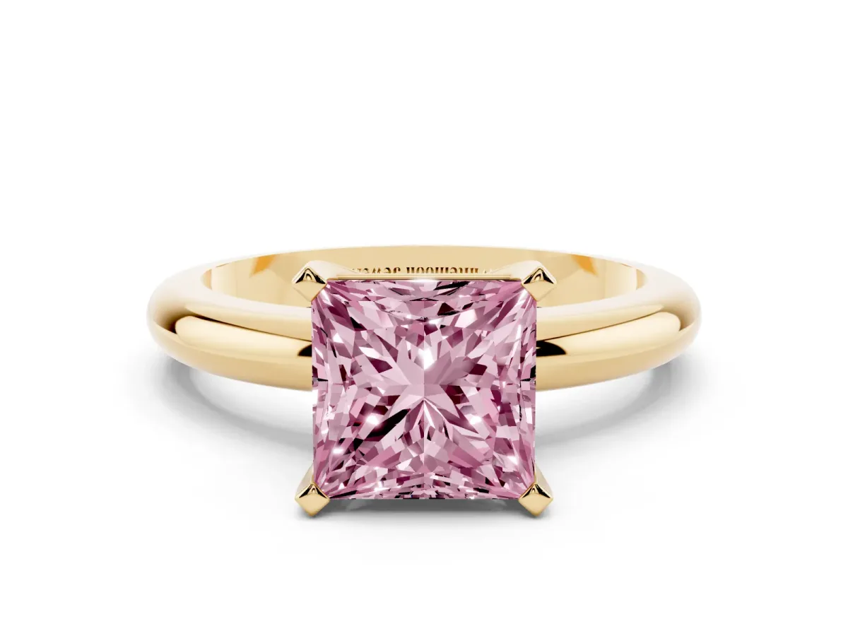 Fancy Pink Princess Cut Diamond Solitaire Engagement Ring with Round Band and Four-Prong Setting Yellow gold