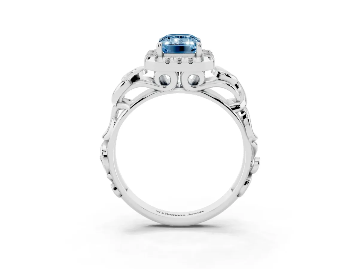 Fancy Blue Emerald Cut Cut Halo Diamond Ring with Scrollwork Band and Four-Prong Setting Silver
