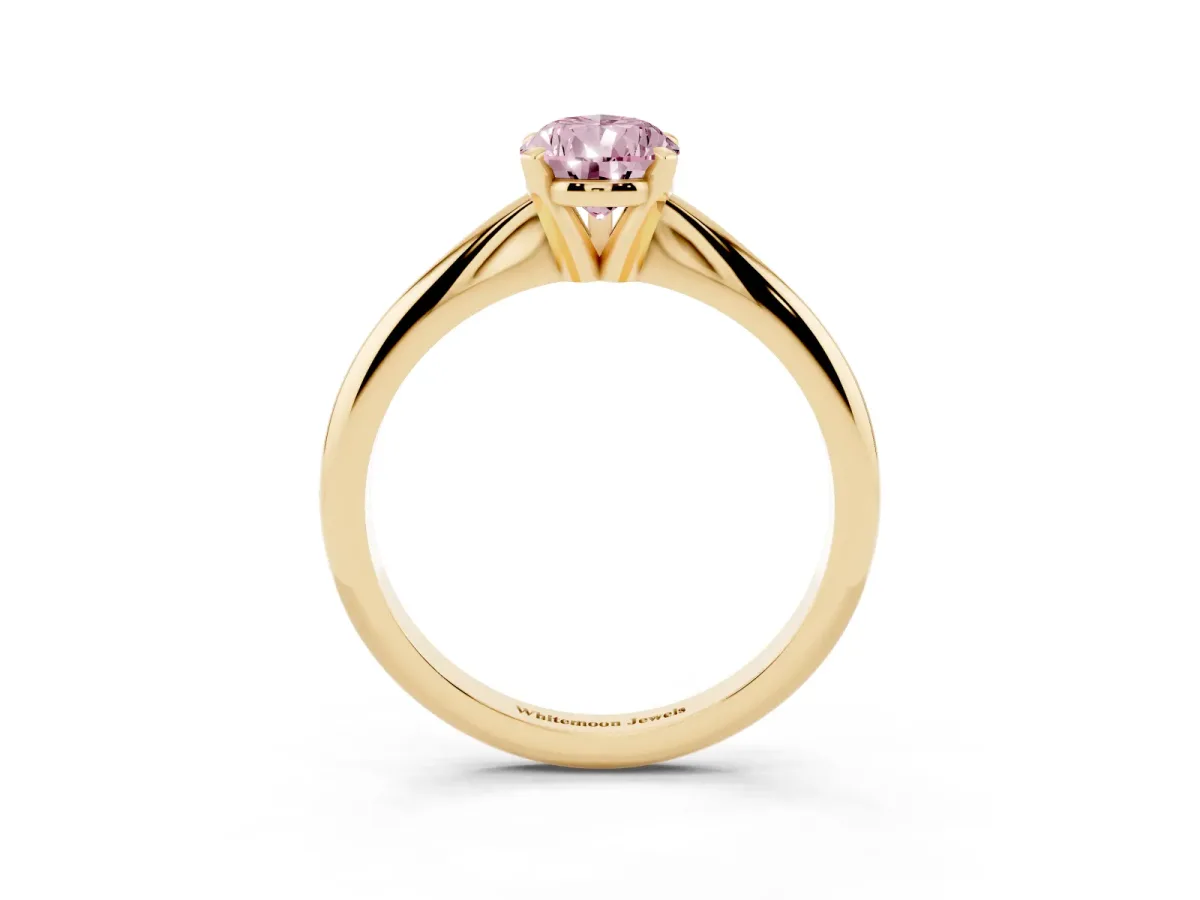 Fancy Pink Pear Cut Cut Solitaire Ring with Four-Prong Setting on a Classic Band Yellow gold