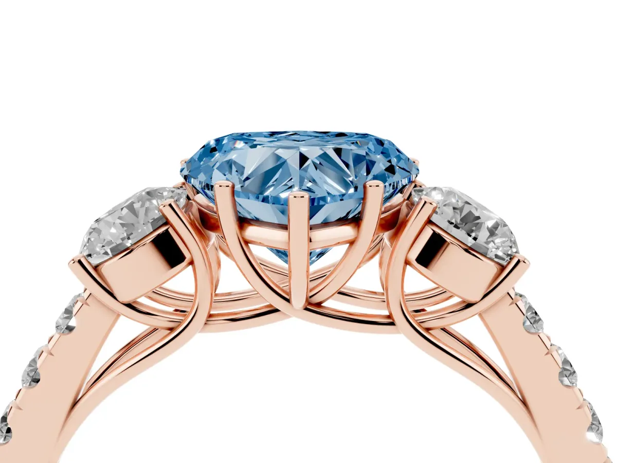 Fancy Blue Heart Cut Cut Diamond Three-Stone Ring with Round Side Stones and Pavé Band Rose gold