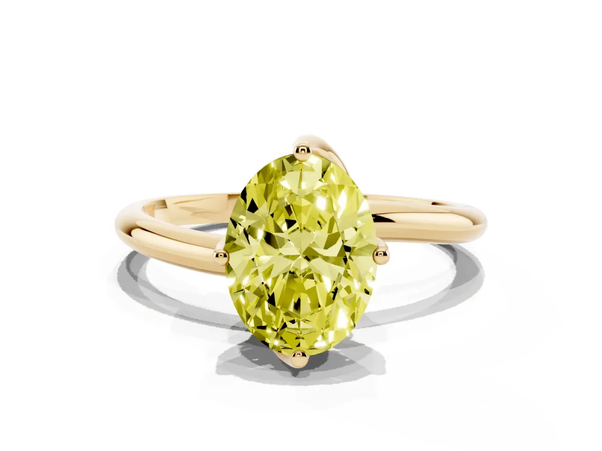 Fancy Yellow Oval Cut Diamond Solitaire Engagement Ring with Four-Prong Setting and Classic Band Yellow gold
