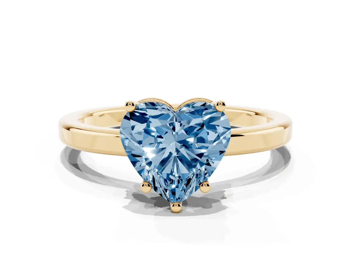 Fancy Blue Heart Cut Cut Solitaire Engagement Ring with Four-Prong Setting on a Classic Band Yellow gold