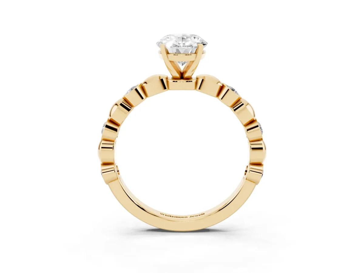 Oval Cut Solitaire Bezel-Set Diamond Ring with Beaded Band and Four-Prong Setting Yellow gold