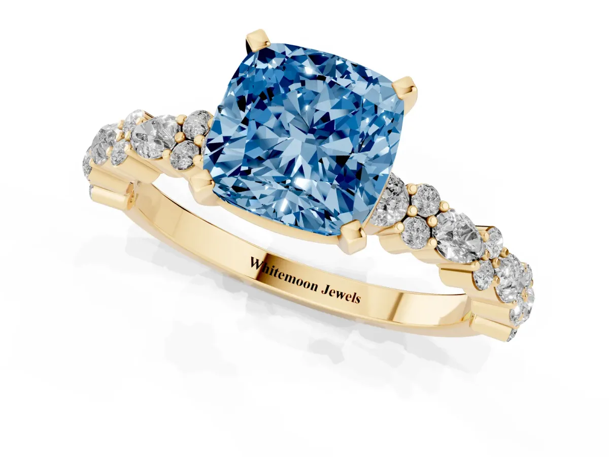 Fancy Blue Cushion Cut Diamond Side Stone Solitaire Ring with Round and Four-Prong Setting Yellow gold