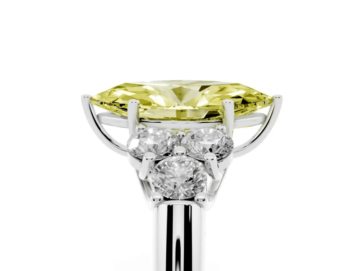Fancy Yellow Marquise Cut Cut Diamond Cluster Ring with Round Accent Stones and Prong Setting on a Classic Band Silver