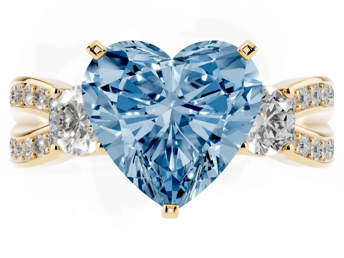 Fancy Blue Three-Stone Heart Cut Cut Diamond Twist Band with Prong Setting Yellow gold