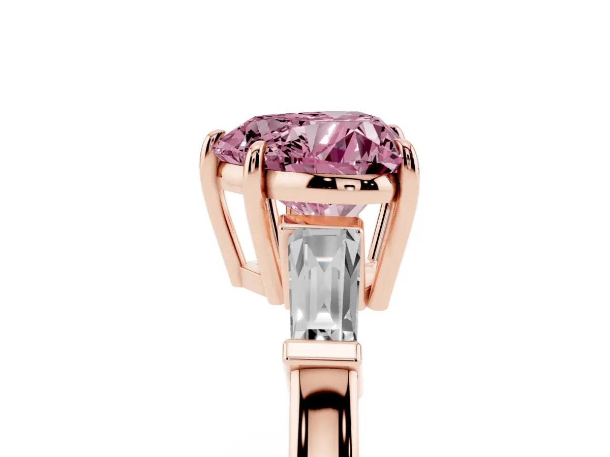 Fancy Pink Heart Cut Diamond Three-Stone Ring with Tapered Baguette Side Stones and Prong Setting Rose gold