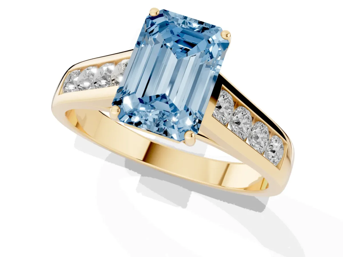 Fancy Blue Emerald Cut Brilliant Channel-Set Solitaire Ring with Four-Prong Setting Yellow gold