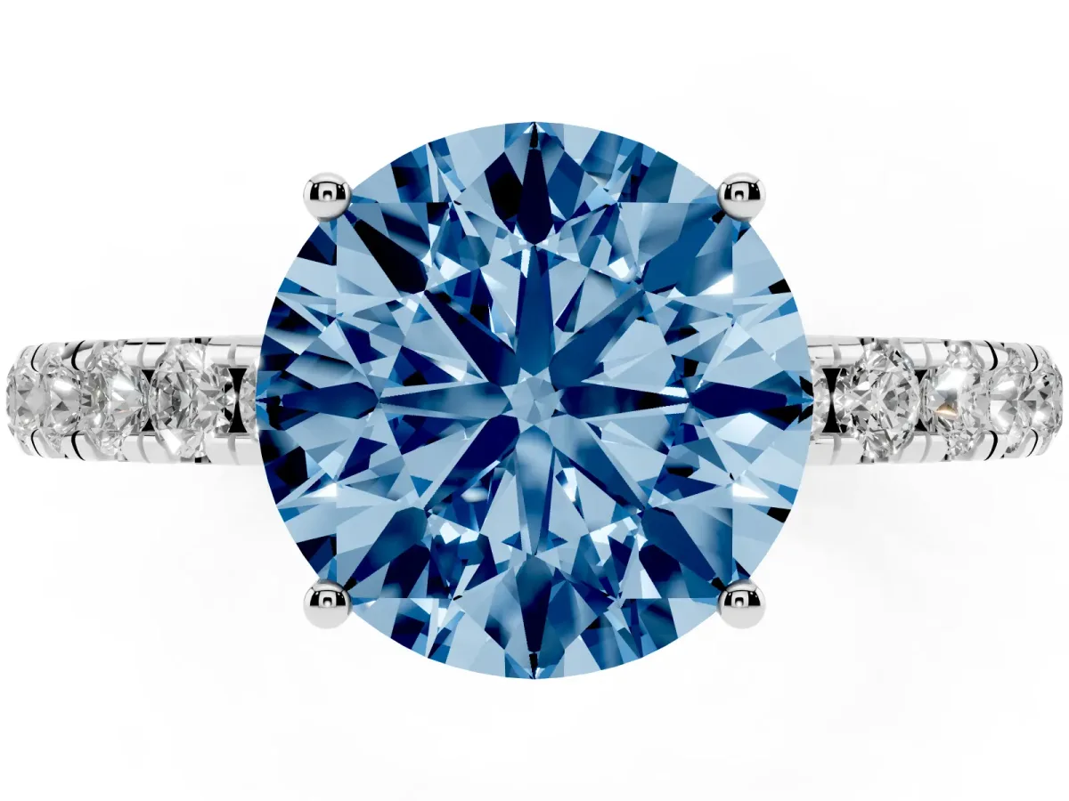 Fancy Blue Round Cut Diamond Pavé Solitaire Engagement Ring with Four-Prong Setting Silver