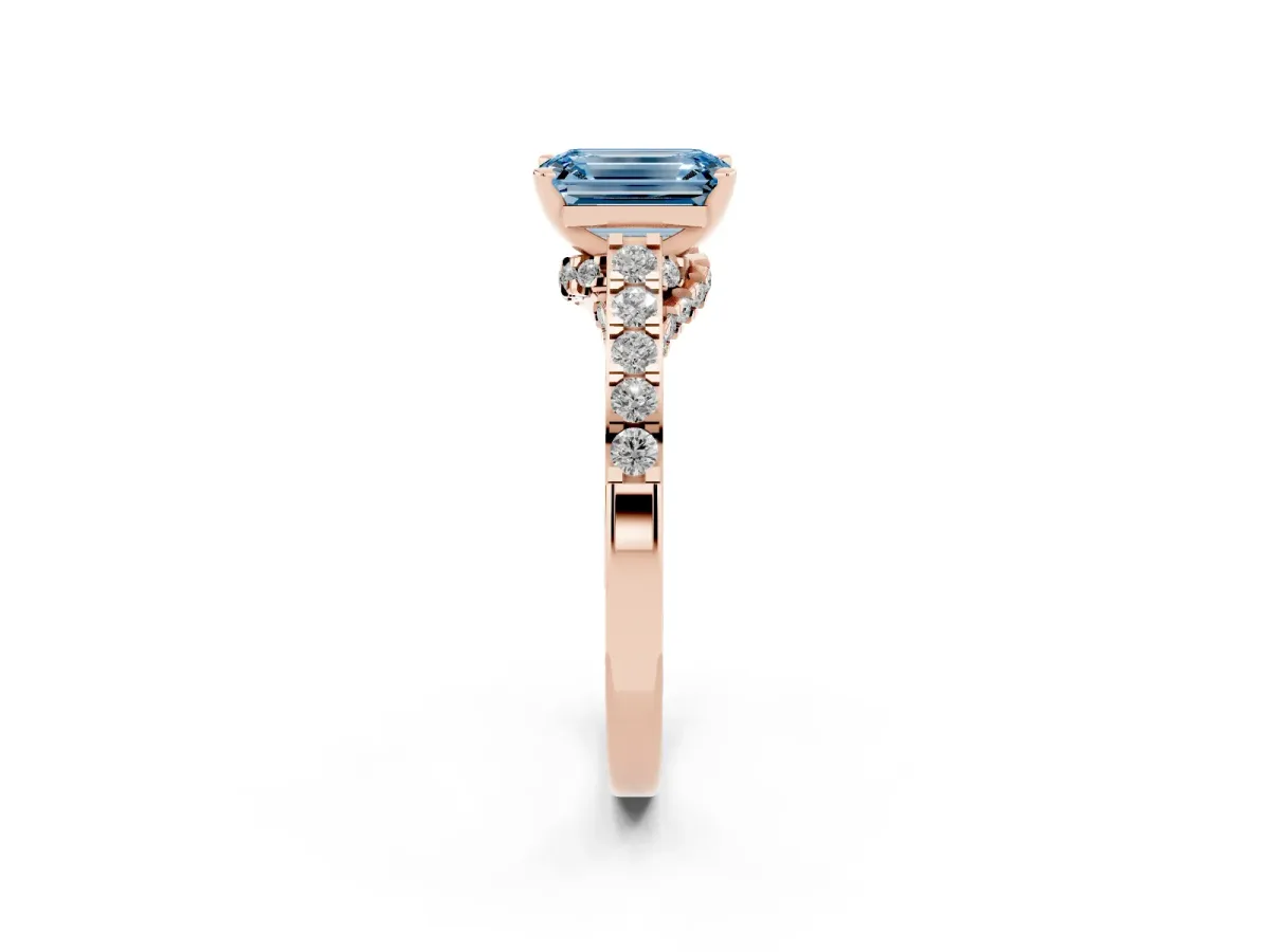 Fancy Blue Emerald Cut Diamond Solitaire Ring with Crossover Gallery and Round Pavé Band Rose gold