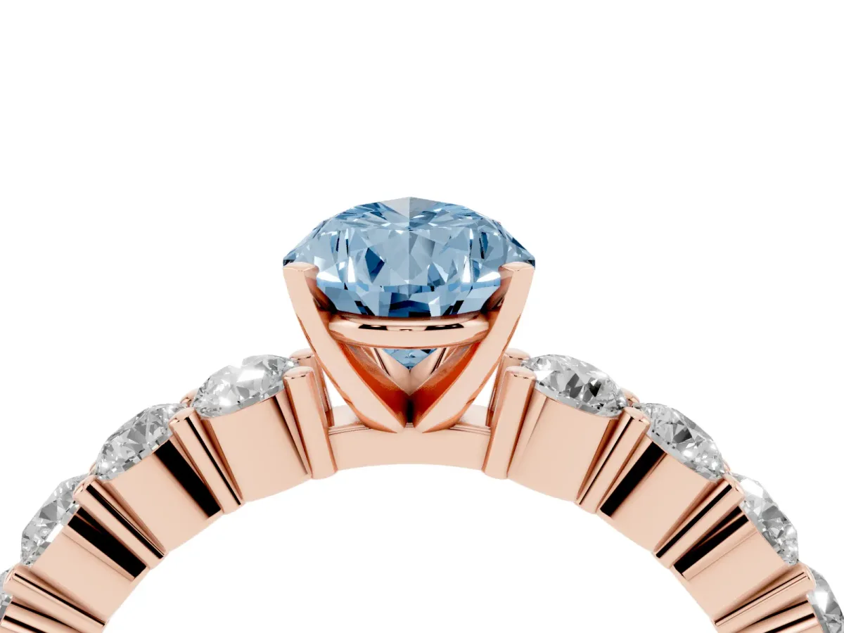 Fancy Blue Pear Cut Diamond Solitaire Ring with Shared Prong Round Side Stones Rose gold